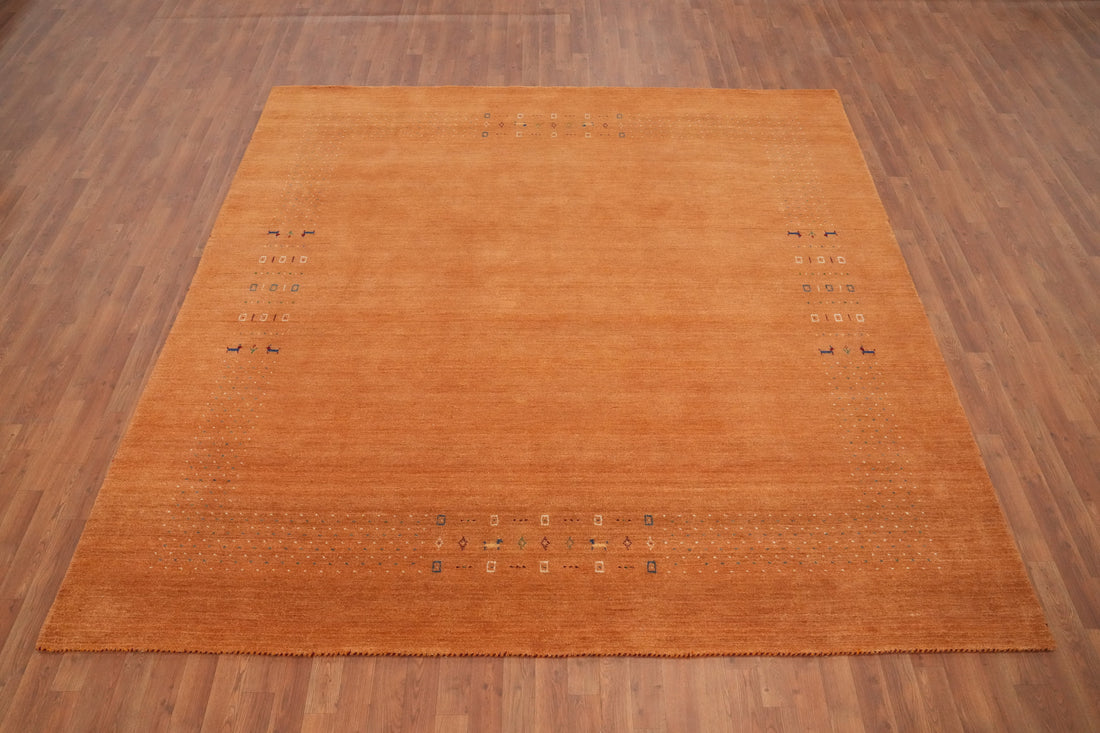 Elegant Terracotta Gabbeh Area Rug 9x9 with Subtle Tribal Accents