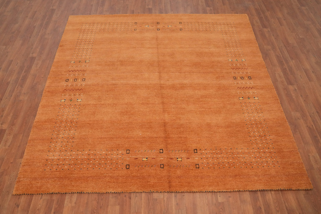 Elegant Terracotta Gabbeh Area Rug 8x8with Subtle Tribal Details and Charm