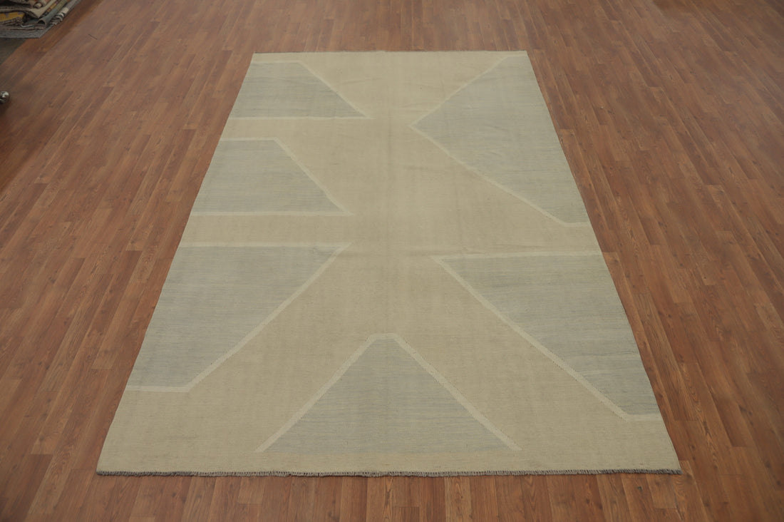 Neutral Toned Rug Showcasing Simple Geometric Shapes 6x10