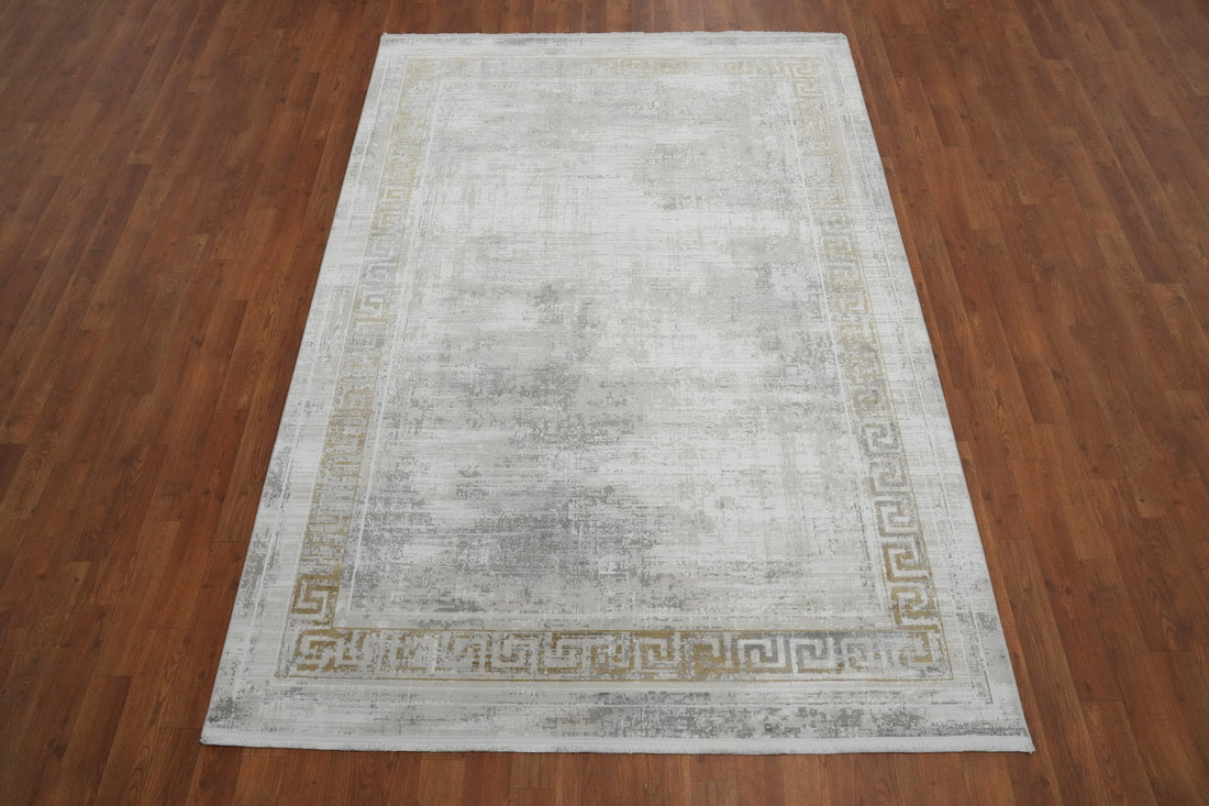 Modern Gray Area Rug 5x7 Featuring Subtle Gold Border Design