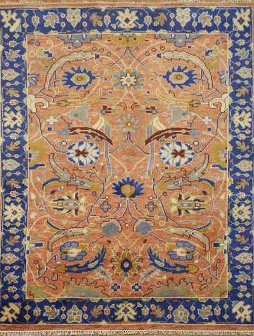 Intricate Floral Orange Rug with Vibrant Blue Border Accent 5'x7'